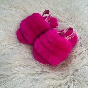 Pink Ugg baby slippers good condition unsure of the exact size
